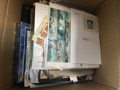 A box containing stock books, covers, albums, stamps on sheets various