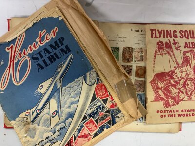 A small collection of vintage stamp albums.