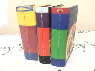Three Harry Potter books including a First edition Harry Potter and the Order of the Phoenix.