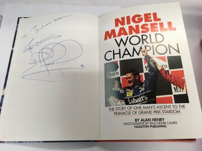A signed Nigel Mansell book.