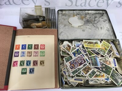 A box of stamps and ephemera.