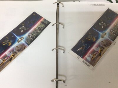 A collection of eleven stamp albums containing British Pictorial used stamps and some loose covers and one other album.