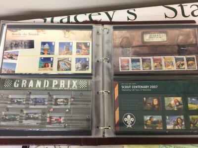 Five  albums containing well presented Pictorial British Elizabeth II presentation packs and some loose sheets.