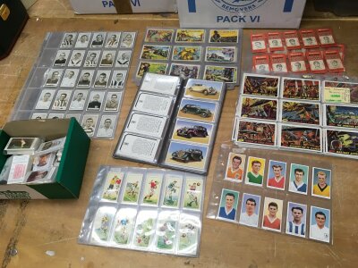 A collection of cigarette cards to include Gallagher, Mars Attacks etc
Famous footballer green back set of 100 1925, Set of Rolls Royce motor cars album, set of ABC battle cards, Set of football tips tricks set of 64 1955
