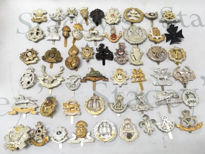 A collection of British military cap badges