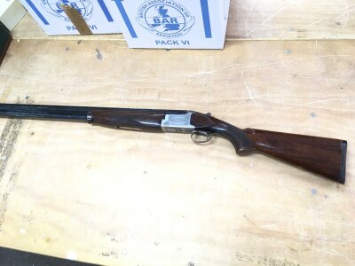 A Miroku 12g over under shotgun. Ejectors and multi choke. Serial number 40710NP. 28 inch barrel and 45 inches overall.

Please note that a shotgun license is required to purchase this lot. Viewing and collection is by appointment only.