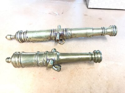 Two antique miniature brass desk cannons.
Larger one is 27cm long.- NO RESERVE
