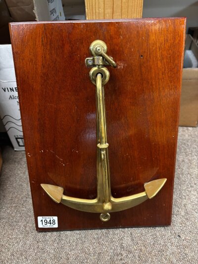A ships brass anchor door knocker