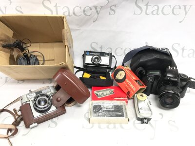 Three cameras including Canon and Kodak etc