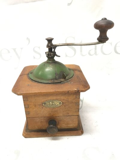 A 19th century French coffee grinder by Peugeot Freres. 21cm tall