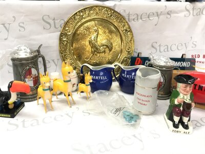 A Collection of pub memorabilia and collectibles including a rubber Guinness toucan by Charles E Tresise , Take Courage brass dish, Guinness ceramic S/P shakers, Warner's keg red barrel light up ornament, four pub umbrellas Kronenbourg 1664 Rayments bitter Greene king
