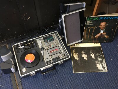 A Sayno vintage solid state stereo music centre model G2311KL with a Beatles and Sinatra LP. No reserve