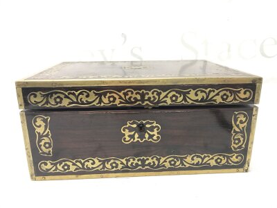 A Georgian rosewood brass inlaid trinket box with key and bottom drawer. Dimensions 24cm wide,11cm tall,18cm deep