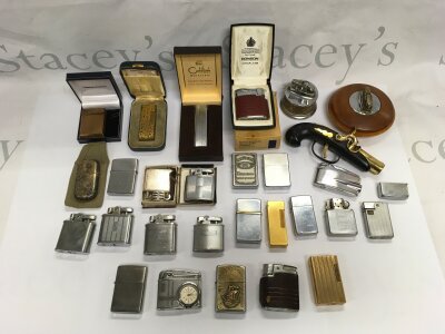 A collection of lighters comprising Dupont, Dunhill, Zippo and other examples.