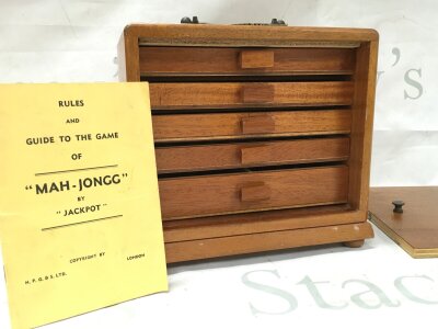 A Mah Jongg Game set in a 5 drawer case. Case size 20cm wide 19cm tall 15cm deep