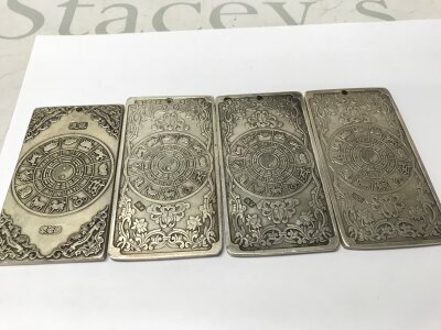 Four Chinese silver style ingots signed , approximately 9.5cmx5cm, total weight 533g