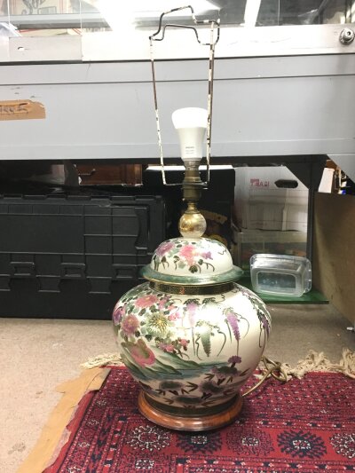 A Chinese style ceramic table lamp with floral design, 66cm tall
