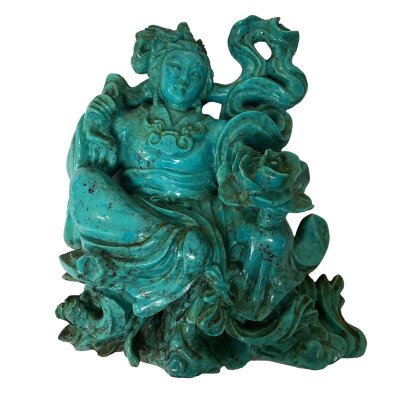 A carved turquoise figure of a seated figure of a guanyin. 10cm