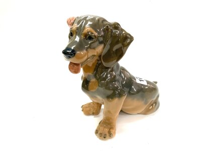 A Royal Copenhagen ceramic model dachshund puppy. H.19cm