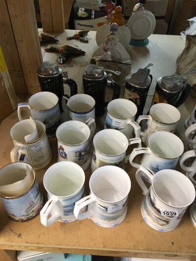 A mixed collection of tankards including four elvis presley design tankards.