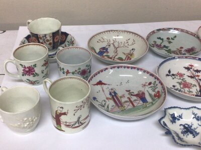 A collection of 18th Century English porcelain polychrome dishes and tea cups including Worcester decorated in the Mandarin Imari influence some hairline cracks etc.