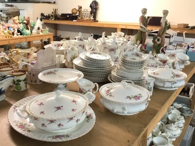 A Royal Albert moss rose tea set including saucers, plates, cups etc