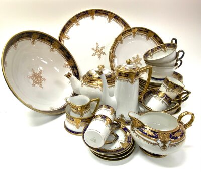 A Noritake porcelain  tea and coffee service with gilt decoration.