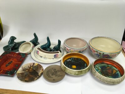 A collection of Poole ceramics including bowls, figures etc.