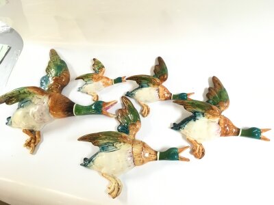 Four Beswick ceramic flying ducks, largest one Czechoslovakian. 14 to 32cm long