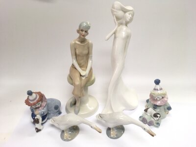 Six Lladro and Royal Doulton figures comprising Cocktails HN3070, two Lladro clowns etc.