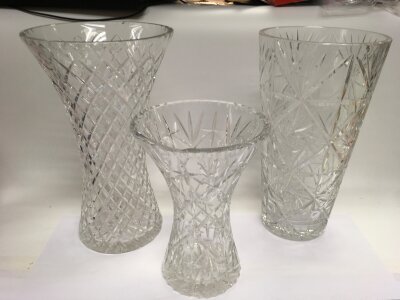 Three large clear glass vases, tallest approx 35.5cm.