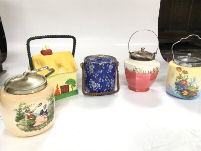A collection of biscuit barrels