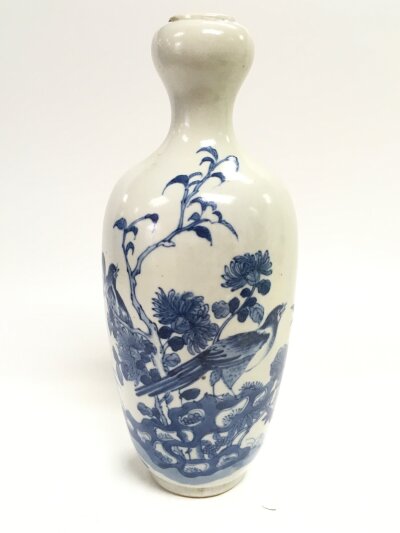 A Chinese blue and white vase, with birds perched on a tree scene decoration. 24cm tall
