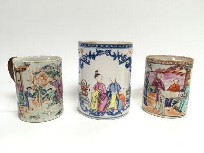 Three Chinese porcelain Famille Rose tankards. 11 and 14cm tall