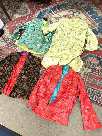 Asian-style jackets in vibrant colors like red( 64cm long) , green (63cm long) and gold (90cm long)