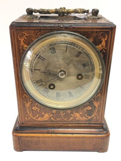 An inlaid mantel clock, with key