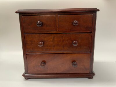 A small Victorian mahogany apprentice chest, 24.5cm x 26.5cm.