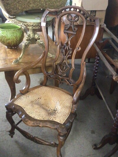 A Victorian towel rail a French 19th century walnut chair with an elaborate back and a fire screen with an embroidered panel and one other chair (4)