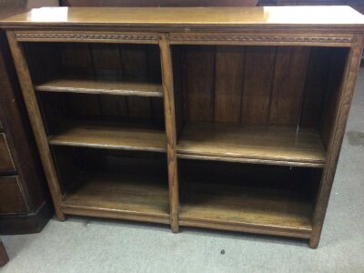 A quality oak open bookcase with adjustable shelves.
