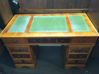 A reproduction pedestal desk, approx 61cm x 72cm x 122cm.