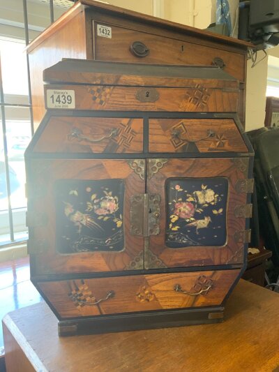 A small Japanese marquetry cabinet with inlaid mother of pearl decoration. 17” x 14” x 6.5”