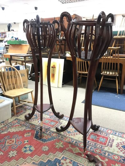 A pair of reproduction mahogany Jardiniere stands, damaged. 128cm tall, 31cm wide inside space