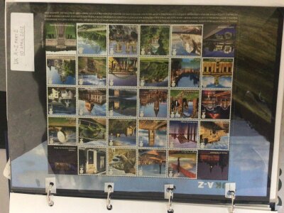 Five albums of stamps including George V George VI and Elizabeth II mainly unused stamps including some presentation packs. (5)