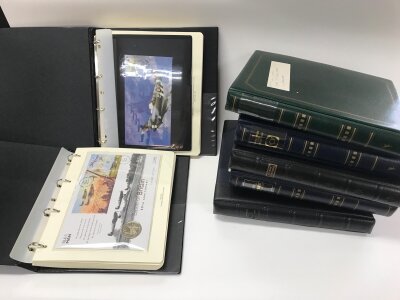 A collection of assorted stamps and first day covers and coin covers.