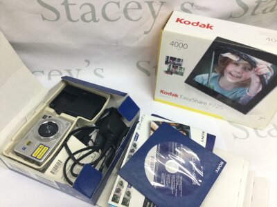 Vintage cameras including Kodak and boxed a boxed Sony digital DSCW110, Kodak brownie 127 , Trentor binoculars 8x30 etc NO RESERVE