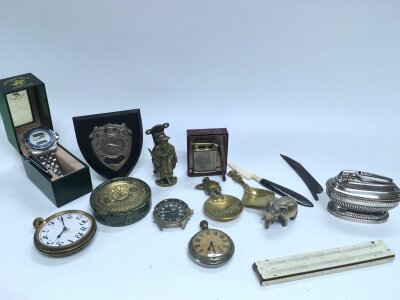A collection of vintage items lighters, watches , motoring badge