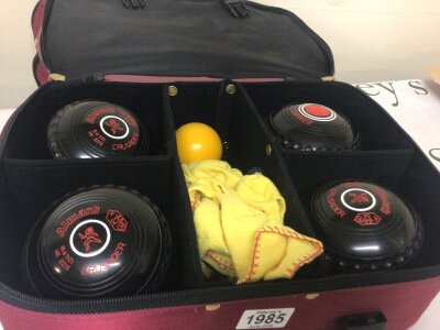 A set of lawn bowls Almark Crusader size 3H very good condition lightly used with a yellow jack ball in a Henselite sectioned canvas bag.