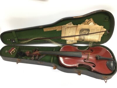 A circa 1940s cased student's violin.