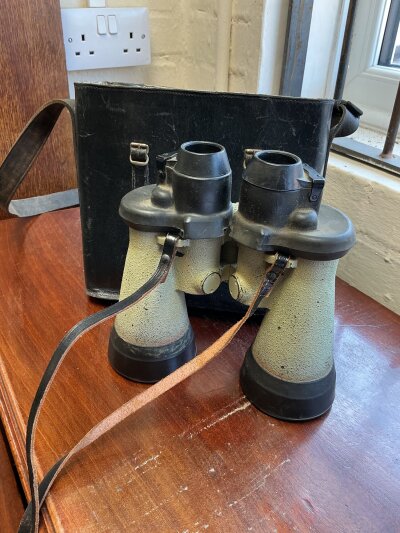A pair of German WWII U Boat binoculars, partially rubber armoured