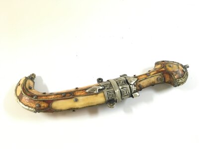 A small 19th century North African knife possibly white metal decoration on bone, signed blade. 24cm long